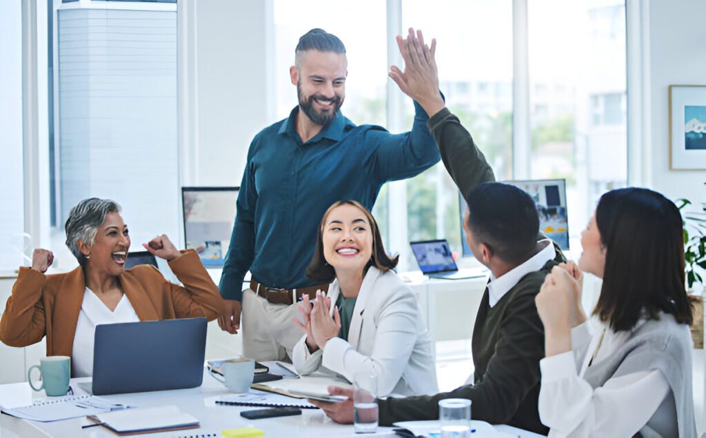 employees gathering and compliment eachother
